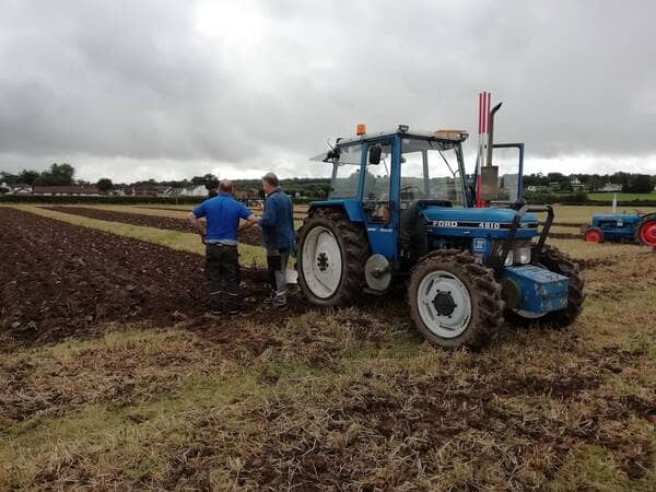 A Ford tractor ploughing at a ploughing match